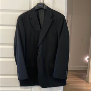 Black Sport Coat with Notched Lapels and Textured Fabric